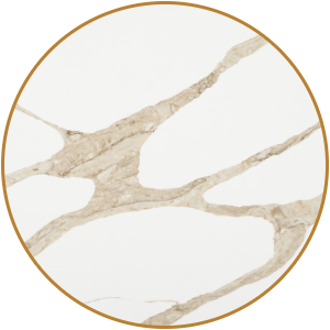 Calacatta Gold quartz slab inventory selection featuring a bright white background with warm gold and gray veining